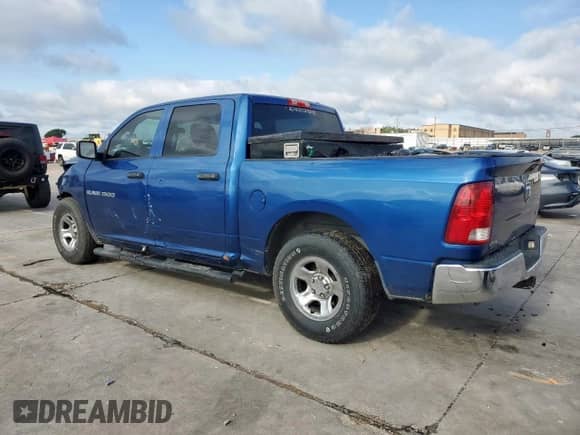 2011 Ram 1500 ST с VIN 1D7RB1CP2BS597052, выставлен на аукционе Copart как лот 56197505 с пробегом 128 837 миль миль и Списание • Salvage title. История ставок и продаж доступна на DreamBid. Изображение 2.