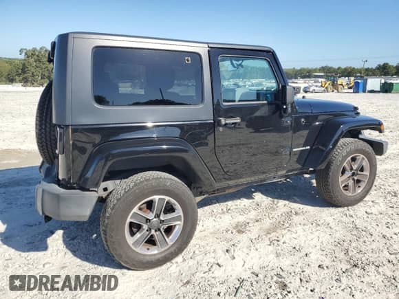 2010 Jeep Wrangler Sahara с VIN 1J4AA5D15AL152772, выставлен на аукционе Copart как лот 84934065 с пробегом 158 263 миль миль и Списание • Salvage title. История ставок и продаж доступна на DreamBid. Изображение 3.