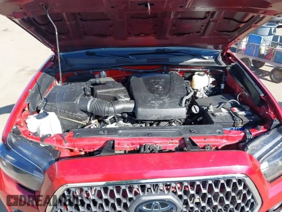 2021 Toyota Tacoma SR z VIN 5TFCZ5AN0MX262902, wystawiony jako IAAI lot #43535009 z przebiegiem 70 926 mil mil oraz . Historia ofert i sprzedaży dostępna na DreamBid. Obrazek 10.