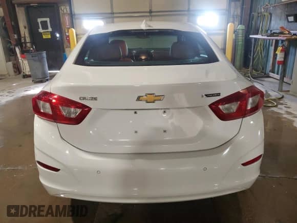 2017 Chevrolet Cruze Premier с VIN 1G1BF5SMXH7188235, выставлен на аукционе Copart как лот 71485915 с пробегом 127 468 миль миль и Списание • Salvage title. История ставок и продаж доступна на DreamBid. Изображение 6.