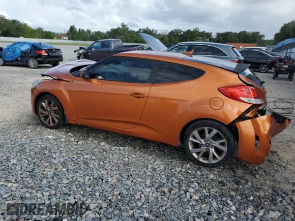 2016 Hyundai Veloster z VIN KMHTC6AD8GU295047, wystawiony jako Copart lot #84794875 z przebiegiem 169 732 mil mil oraz Szkoda całkowita • Salvage title. Historia ofert i sprzedaży dostępna na DreamBid. Obrazek 2.