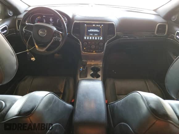 2018 Jeep Grand Cherokee Overland with VIN 1C4RJFCTXJC453250, listed as a Copart auction lot 64644784 with 194,353 mi miles and Salvage title. Bid and sale history available at DreamBid. Image 8.
