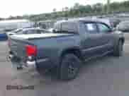 2021 Toyota Tacoma SR with VIN 3TMCZ5AN7MM383352, listed as a IAAI auction lot 43246296 with 44,937 mi miles and . Bid and sale history available at DreamBid. Image 4.
