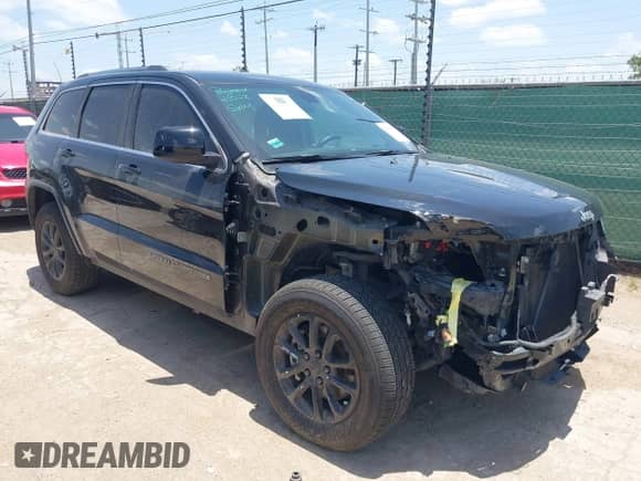 2021 Jeep Grand Cherokee Laredo E with VIN 1C4RJEAG3MC814385, listed as a IAAI auction lot 42570905 with 29,229 mi miles and . Bid and sale history available at DreamBid. Image 1.