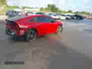 2024 Toyota Prius LE with VIN JTDACAAU7R3023449, listed as a IAAI auction lot 43136259 with 31,158 mi miles and . Bid and sale history available at DreamBid. Image 4.