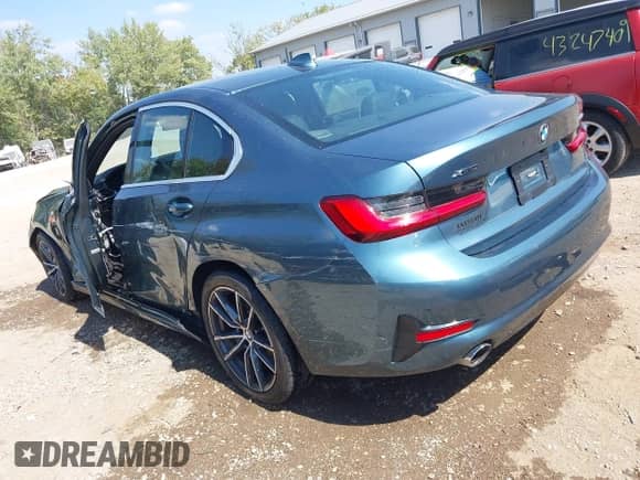 2021 BMW 3 Series 330e xDrive z VIN 3MW5P9J07M8B73432, wystawiony jako IAAI lot #43228949 z przebiegiem 37 102 mil mil oraz . Historia ofert i sprzedaży dostępna na DreamBid. Obrazek 3.
