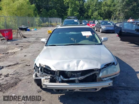 1998 Honda Accord EX z VIN 1HGCG1656WA076344, wystawiony jako IAAI lot #42902213 z przebiegiem Nie podano mil oraz . Historia ofert i sprzedaży dostępna na DreamBid. Obrazek 13.