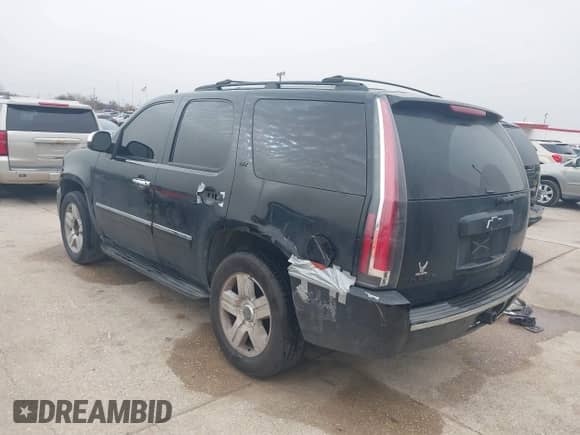 2011 Chevrolet Tahoe LTZ with VIN 1GNSCCE06BR394250, listed as a IAAI auction lot 41746923 with 269,069 mi miles and . Bid and sale history available at DreamBid. Image 3.