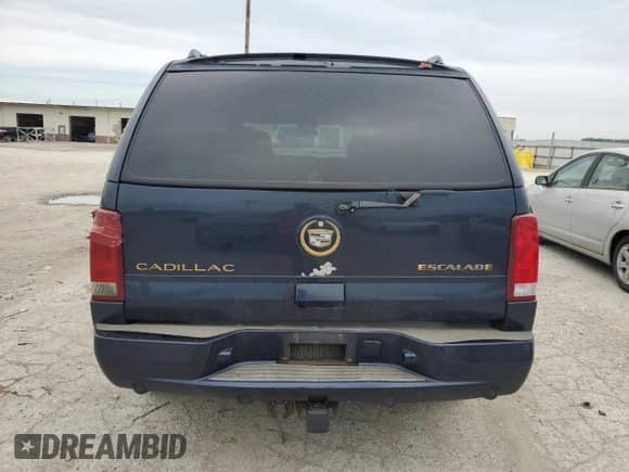 2004 Cadillac Escalade z VIN 1GYEK63N54R194255, wystawiony jako Copart lot #61203985 z przebiegiem 269 600 mil mil oraz Czysty tytuł • Clean title. Historia ofert i sprzedaży dostępna na DreamBid. Obrazek 6.