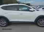 2016 Hyundai Tucson Sport with VIN KM8J33A22GU242249, listed as a IAAI auction lot 43444641 with 117,553 mi miles and . Bid and sale history available at DreamBid. Image 13.