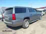 2020 Chevrolet Suburban LT with VIN 1GNSKHKC1LR156323, listed as a IAAI auction lot 42541369 with Not provided miles and . Bid and sale history available at DreamBid. Image 4.