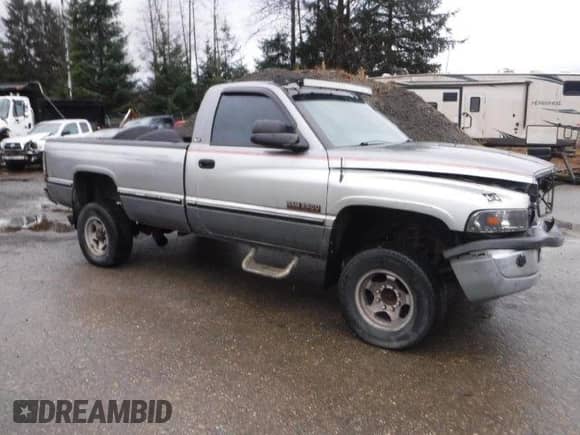 1994 Dodge 2500 with VIN 1B7KF26C8RS684267, listed as a Copart auction lot 48222705 with 175,551 mi miles and Salvage title. Bid and sale history available at DreamBid. Image 4.