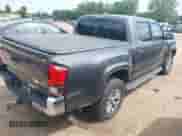 2018 Toyota Tacoma SR5 with VIN 5TFAZ5CN2JX061728, listed as a IAAI auction lot 42775812 with 119,408 mi miles and . Bid and sale history available at DreamBid. Image 4.