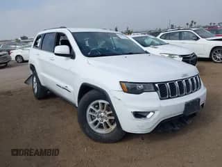 2020 Jeep Grand Cherokee Laredo E with VIN 1C4RJEAG4LC245884, listed as a IAAI auction lot 42564754 with 63,356 mi miles and . Bid and sale history available at DreamBid. Image 1.