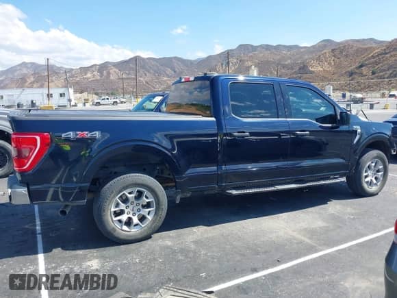 2023 Ford F-150 XLT с VIN 1FTFW1E89PKE05060, выставлен на аукционе IAAI как лот 43299204 с пробегом 79 389 миль миль и . История ставок и продаж доступна на DreamBid. Изображение 14.