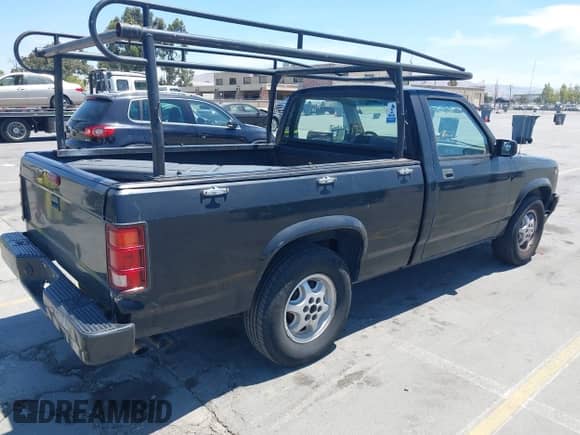 1996 Dodge Dakota SLT z VIN 1B7FL26X0TW703441, wystawiony jako IAAI lot #42859049 z przebiegiem 179 462 mil mil oraz . Historia ofert i sprzedaży dostępna na DreamBid. Obrazek 4.