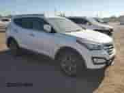 2014 Hyundai Santa Fe с VIN 5XYZU3LBXEG222654, выставлен на аукционе Copart как лот 82161845 с пробегом 174 018 миль миль и Списание • Salvage title. История ставок и продаж доступна на DreamBid. Изображение 4.