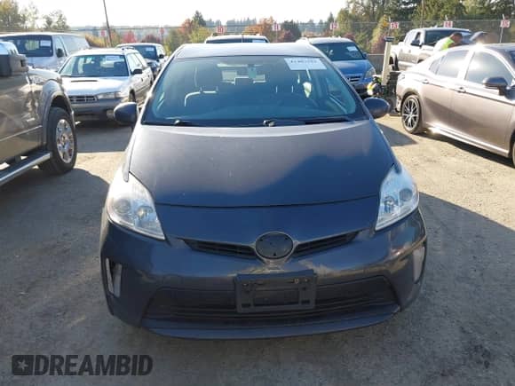 2012 Toyota Prius Three with VIN JTDKN3DU8C1568391, listed as a IAAI auction lot 43407581 with 214,858 mi miles and . Bid and sale history available at DreamBid. Image 12.