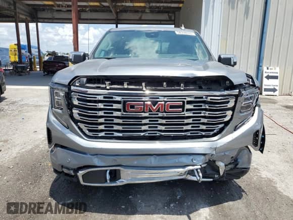 2023 GMC Sierra 1500 Denali z VIN 1GTUUGED7PZ270231, wystawiony jako Copart lot #58398935 z przebiegiem 14 572 mil mil oraz Nie do naprawy • Non repairable. Historia ofert i sprzedaży dostępna na DreamBid. Obrazek 5.