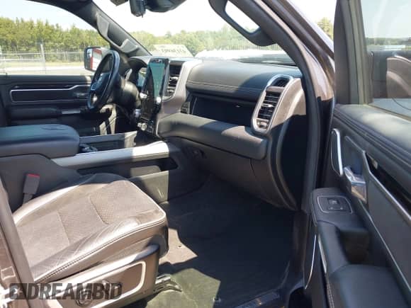 2021 Ram 1500 Laramie z VIN 1C6SRFJT3MN581701, wystawiony jako IAAI lot #43136993 z przebiegiem 96 977 mil mil oraz . Historia ofert i sprzedaży dostępna na DreamBid. Obrazek 5.