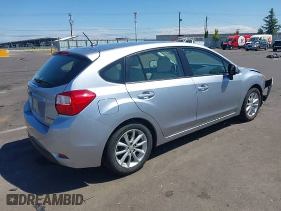 2014 Subaru Impreza Premium with VIN JF1GPAC63E8291981, listed as a IAAI auction lot 42842971 with 56,343 mi miles and . Bid and sale history available at DreamBid. Image 4.