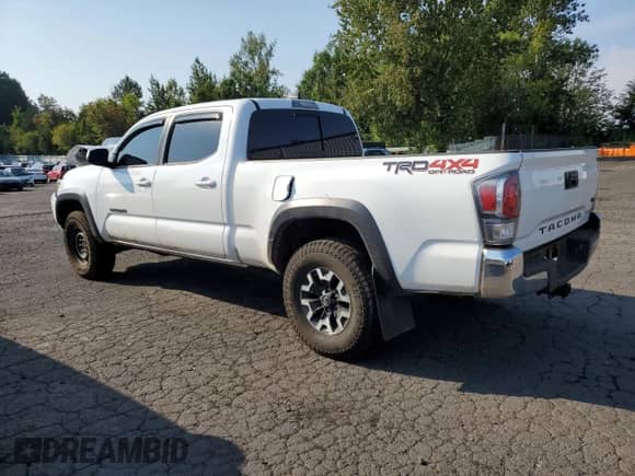 2022 Toyota Tacoma SR5 with VIN 3TMDZ5BN4NM130770, listed as a Copart auction lot 71835345 with 67,026 mi miles and Salvage title. Bid and sale history available at DreamBid. Image 2.