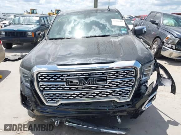 2020 GMC Sierra 1500 Denali with VIN 3GTU9FEL7LG370858, listed as a IAAI auction lot 42574907 with 27,005 mi miles and . Bid and sale history available at DreamBid. Image 12.