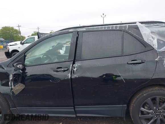 2023 Chevrolet Equinox RS with VIN 3GNAXWEG2PL232791, listed as a IAAI auction lot 43026110 with 58,059 mi miles and . Bid and sale history available at DreamBid. Image 14.