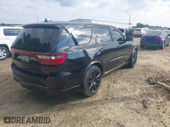 2018 Dodge Durango SRT with VIN 1C4SDJGJXJC213653, listed as a IAAI auction lot 42765062 with Not provided miles and . Bid and sale history available at DreamBid. Image 4.