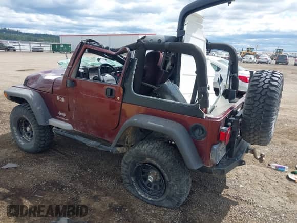 2003 Jeep Wrangler X with VIN 1J4FA39S73P349014, listed as a IAAI auction lot 42582747 with 50,525 mi miles and . Bid and sale history available at DreamBid. Image 3.