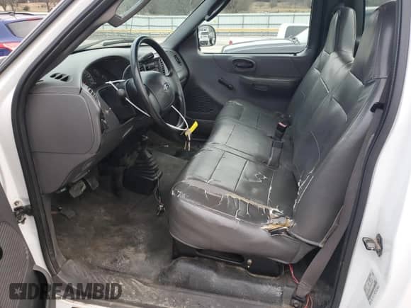 2003 Ford F-150 XL z VIN 1FTRF18W03NA77544, wystawiony jako Copart lot #84805894 z przebiegiem Nie podano mil oraz Szkoda całkowita • Salvage title. Historia ofert i sprzedaży dostępna na DreamBid. Obrazek 7.