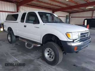 1999 Toyota Tacoma z VIN 4TAWN72N5XZ406015, wystawiony jako IAAI lot #43268220 z przebiegiem 321 963 mil mil oraz . Historia ofert i sprzedaży dostępna na DreamBid. Obrazek 1.
