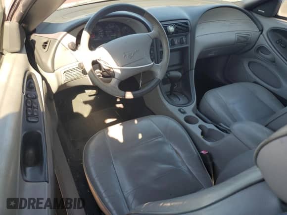 2004 Ford Mustang Deluxe с VIN 1FAFP44404F102515, выставлен на аукционе Copart как лот 75318024 с пробегом 65 383 миль миль и Списание • Salvage title. История ставок и продаж доступна на DreamBid. Изображение 8.