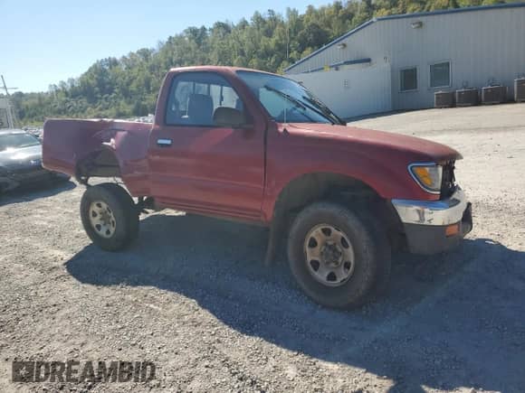 1996 Toyota Tacoma z VIN 4TAPM62N7TZ136944, wystawiony jako Copart lot #82388415 z przebiegiem 203 425 mil mil oraz Szkoda całkowita • Salvage title. Historia ofert i sprzedaży dostępna na DreamBid. Obrazek 4.