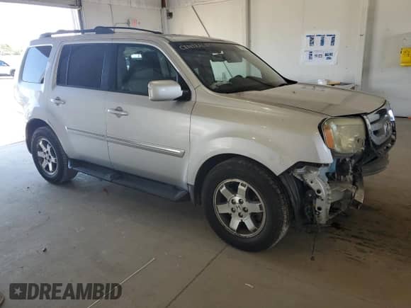 2009 Honda Pilot Touring с VIN 5FNYF48929B002908, выставлен на аукционе Copart как лот 81255035 с пробегом Не указан миль и Списание • Salvage title. История ставок и продаж доступна на DreamBid. Изображение 4.