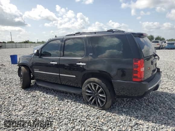 2010 Chevrolet Tahoe LTZ z VIN 1GNUKCE0XAR206095, wystawiony jako Copart lot #59628105 z przebiegiem 131 904 mil mil oraz Szkoda całkowita • Salvage title. Historia ofert i sprzedaży dostępna na DreamBid. Obrazek 2.