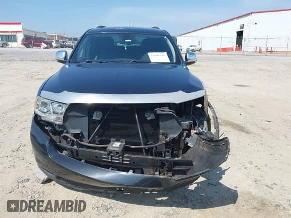 2012 Dodge Durango Citadel with VIN 1C4SDHET0CC112539, listed as a IAAI auction lot 42581926 with 150,429 mi miles and . Bid and sale history available at DreamBid. Image 13.