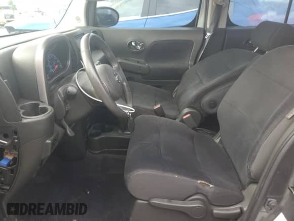 2012 Nissan Cube SL with VIN JN8AZ2KR0CT255062, listed as a Copart auction lot 58549275 with 130,369 mi miles and Salvage title. Bid and sale history available at DreamBid. Image 7.