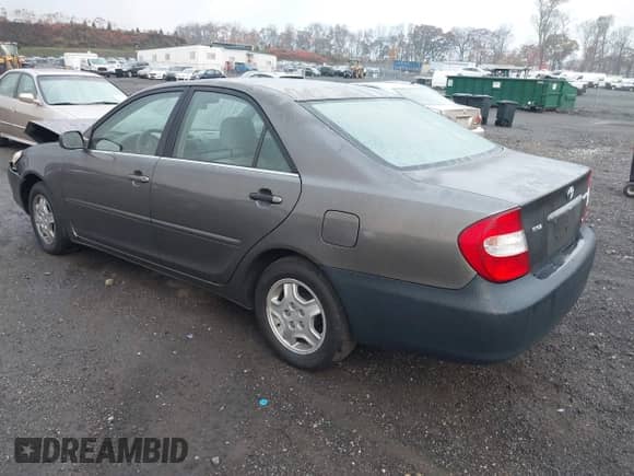 2003 Toyota Camry LE with VIN 4T1BF32K43U562869, listed as a IAAI auction lot 43506255 with 121,868 mi miles and . Bid and sale history available at DreamBid. Image 3.