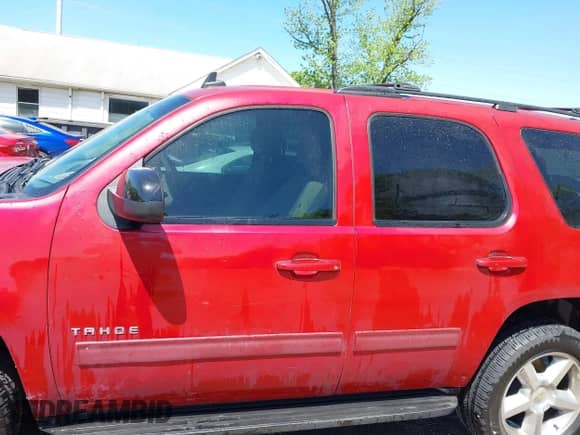2013 Chevrolet Tahoe LS with VIN 1GNSKAE05DR187598, listed as a IAAI auction lot 42104827 with 314,751 mi miles and . Bid and sale history available at DreamBid. Image 14.