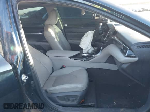 2021 Toyota Camry Hybrid XSE with VIN 4T1K31AK0MU553439, listed as a IAAI auction lot 41558012 with 105,943 mi miles and . Bid and sale history available at DreamBid. Image 5.