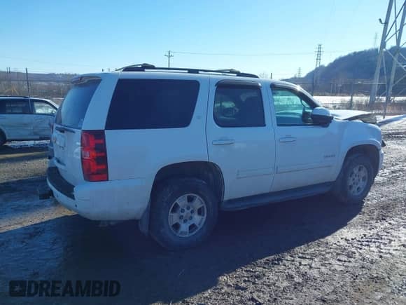 2013 Chevrolet Tahoe LS with VIN 1GNSKAE06DR187867, listed as a IAAI auction lot 41352892 with 110,116 mi miles and . Bid and sale history available at DreamBid. Image 4.