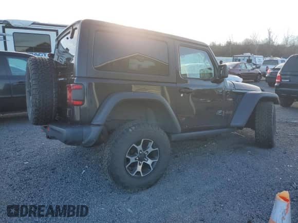 2020 Jeep Wrangler Rubicon with VIN 1C4HJXCG0LW194810, listed as a Copart auction lot 87317364 with 49,836 mi miles and Salvage title. Bid and sale history available at DreamBid. Image 3.