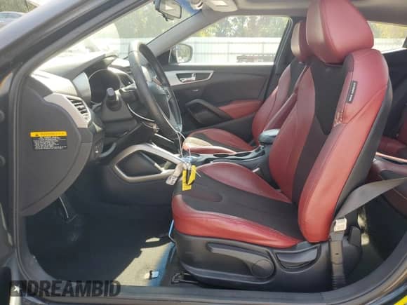 2012 Hyundai Veloster w/Gray Int z VIN KMHTC6AD1CU077462, wystawiony jako Copart lot #81556725 z przebiegiem 133 710 mil mil oraz Szkoda całkowita • Salvage title. Historia ofert i sprzedaży dostępna na DreamBid. Obrazek 7.