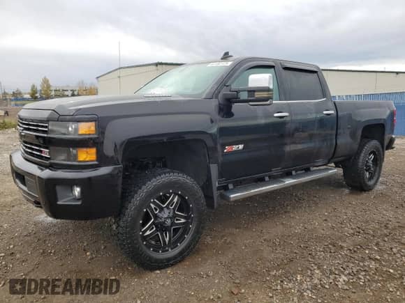 2015 Chevrolet Silverado 3500HD LTZ с VIN 1GC4K0C80FF638977, выставлен на аукционе Copart как лот 63182725 с пробегом 204 968 миль миль и Списание • Salvage title. История ставок и продаж доступна на DreamBid. Изображение 1.