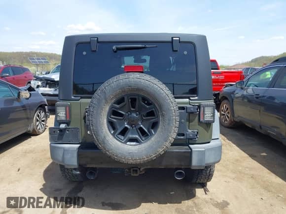 2015 Jeep Wrangler Sport with VIN 1C4AJWAG1FL714131, listed as a IAAI auction lot 42112376 with 81,998 mi miles and . Bid and sale history available at DreamBid. Image 17.
