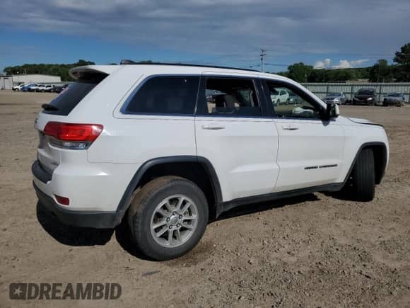2018 Jeep Grand Cherokee Laredo z VIN 1C4RJEAG9JC399861, wystawiony jako Copart lot #54886494 z przebiegiem 100 762 mil mil oraz Szkoda całkowita • Salvage title. Historia ofert i sprzedaży dostępna na DreamBid. Obrazek 3.