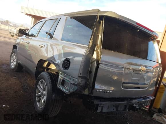 2019 Chevrolet Tahoe LS with VIN 1GNSCAKC5KR200293, listed as a IAAI auction lot 41509854 with 77,823 mi miles and . Bid and sale history available at DreamBid. Image 3.