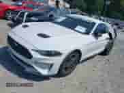 2021 Ford Mustang EcoBoost z VIN 1FA6P8TH2M5151703, wystawiony jako IAAI lot #42798620 z przebiegiem 36 686 mil mil oraz . Historia ofert i sprzedaży dostępna na DreamBid. Obrazek 2.