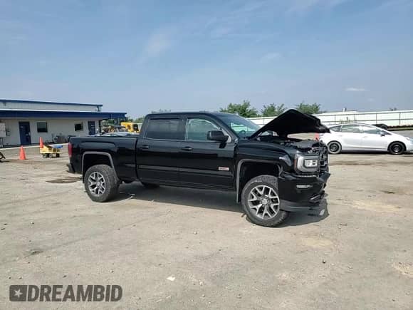 2017 GMC Sierra 1500 SLT z VIN 3GTU2NEC2HG320424, wystawiony jako Copart lot #81571605 z przebiegiem 88 006 mil mil oraz Czysty tytuł • Clean title. Historia ofert i sprzedaży dostępna na DreamBid. Obrazek 13.